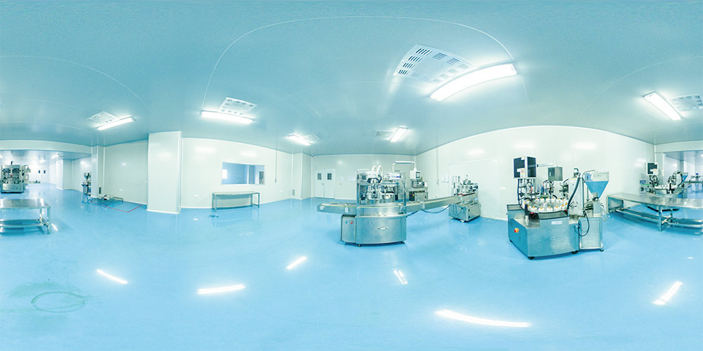 AllTimeCare's distillation workshop with clean floor and multiple production lines